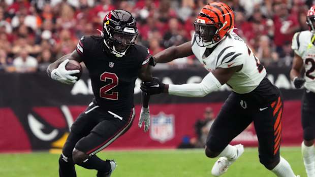 Arizona Cardinals receiver Marquise Brown (2) runs against Cincinnati Bengals safety Jordan Battle (27) at State Farm Stadium.